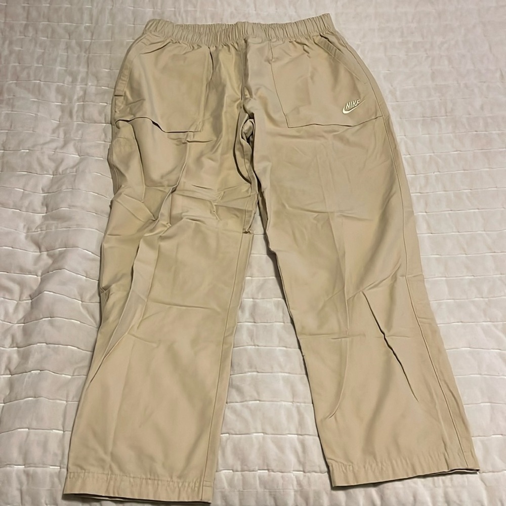 Nike woven athletic pants.